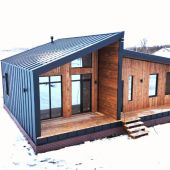 Почему в каркасном доме с панорамным остеклением комфортно даже в мороз?