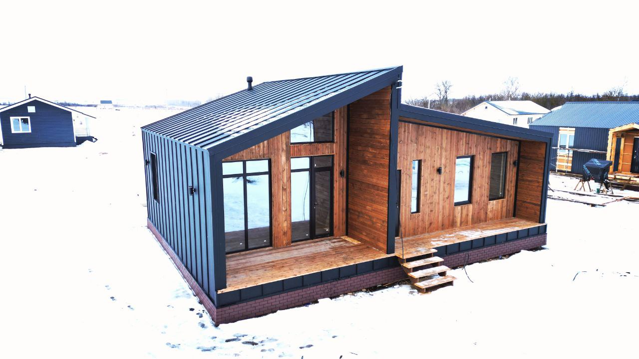 Почему в каркасном доме с панорамным остеклением комфортно даже в мороз?